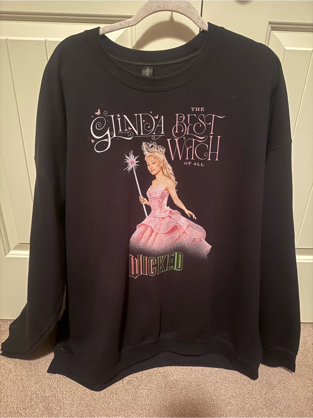 Hot Topic Black Sweatshirt with Pink Graphic "Glinda Best Witch"